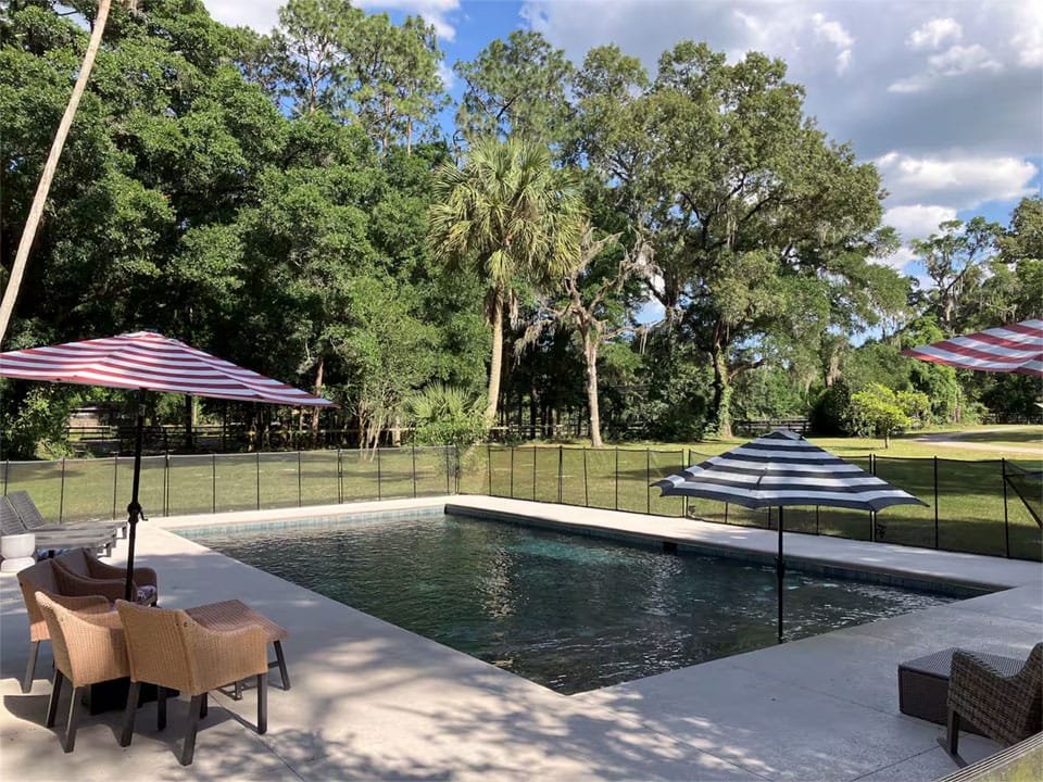 Ocala-Retreat-home-back-groundlevel-pool-960x720